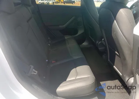 2025 Tesla Model Y from USA, damaged, VIN 7SAYGDED2SA379489